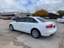 2010 White /Tan Audi A4 (WAUEFAFLXAN) with an 4 Cylinders F 2.0L FI Turbo DOHC 121 CID engine, AUTOMATIC transmission, located at 1830 North Belt Line Road, Irving, TX, 75061, (469) 524-0199, 32.834373, -96.993584 - Photo#2